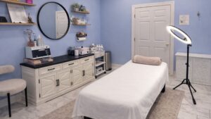 Professional waxing treatment room at Ithaca Wax & Beauty Therapy in Ithaca NY featuring a clean treatment bed, soft lighting, and organized waxing setup