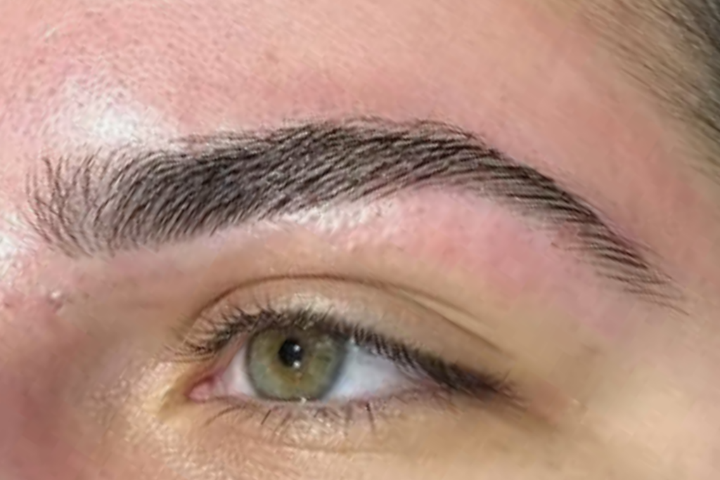 Close-up of a precisely shaped eyebrow after a professional eyebrow wax at Ithaca Wax & Beauty Therapy in Ithaca, NY